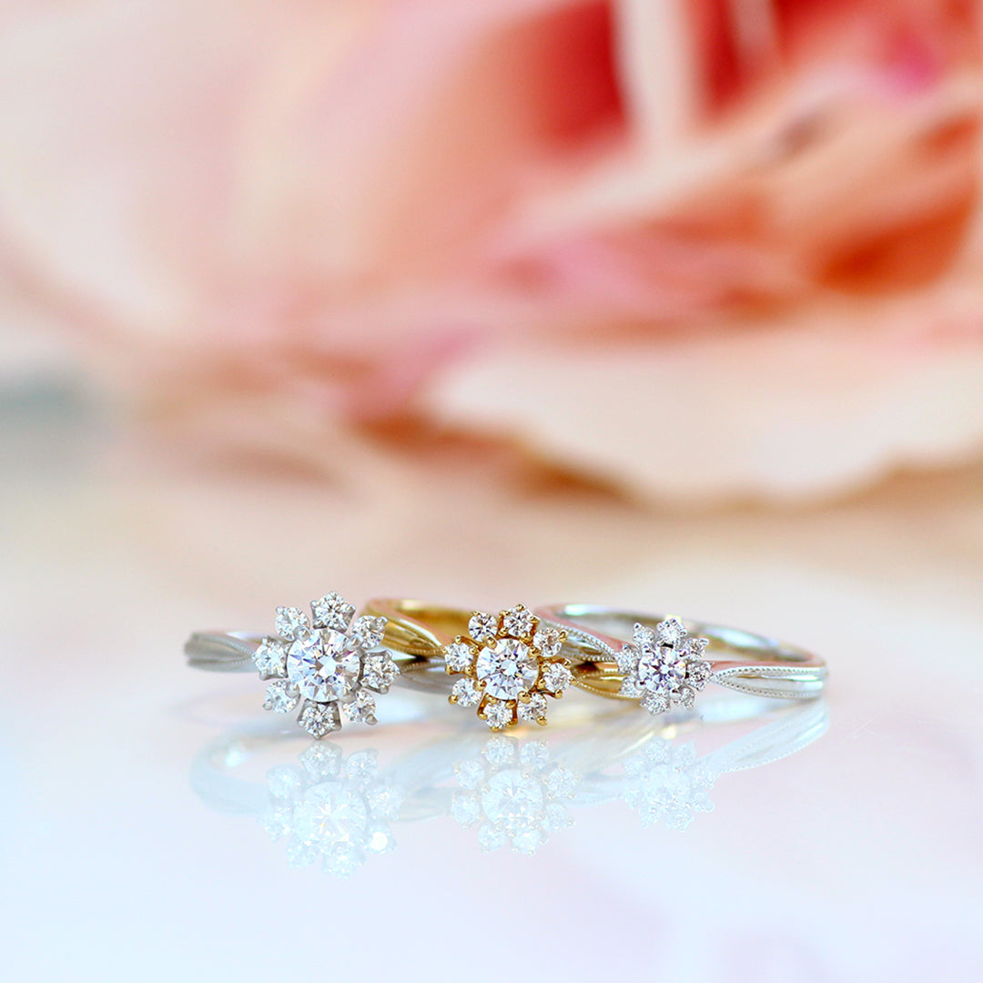 ダイヤモンド K18/PTリング・ピヴォワンヌ