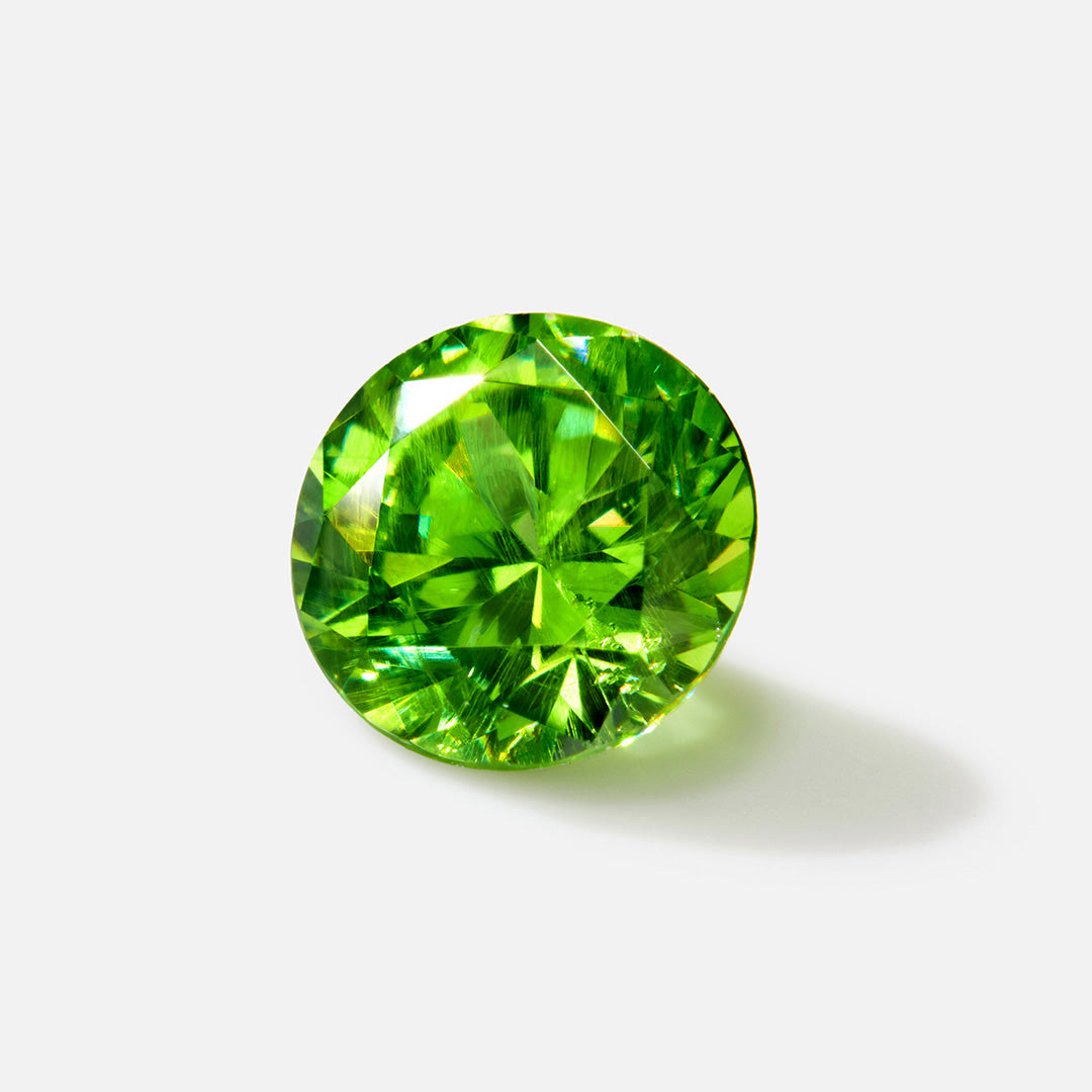 ビズー公式】デマントイドガーネット K18/PT リング・アクサンテール